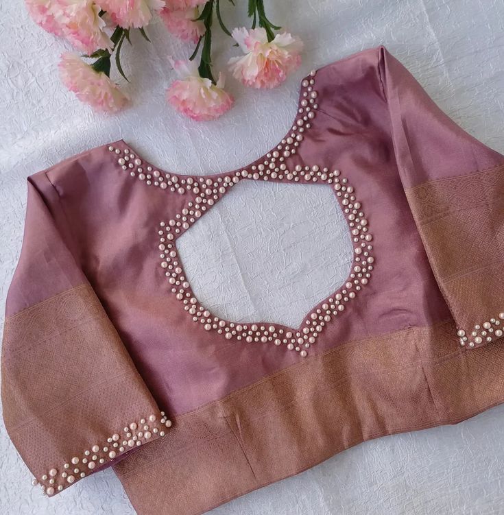 Slate blouse with scalloped stonework neckline